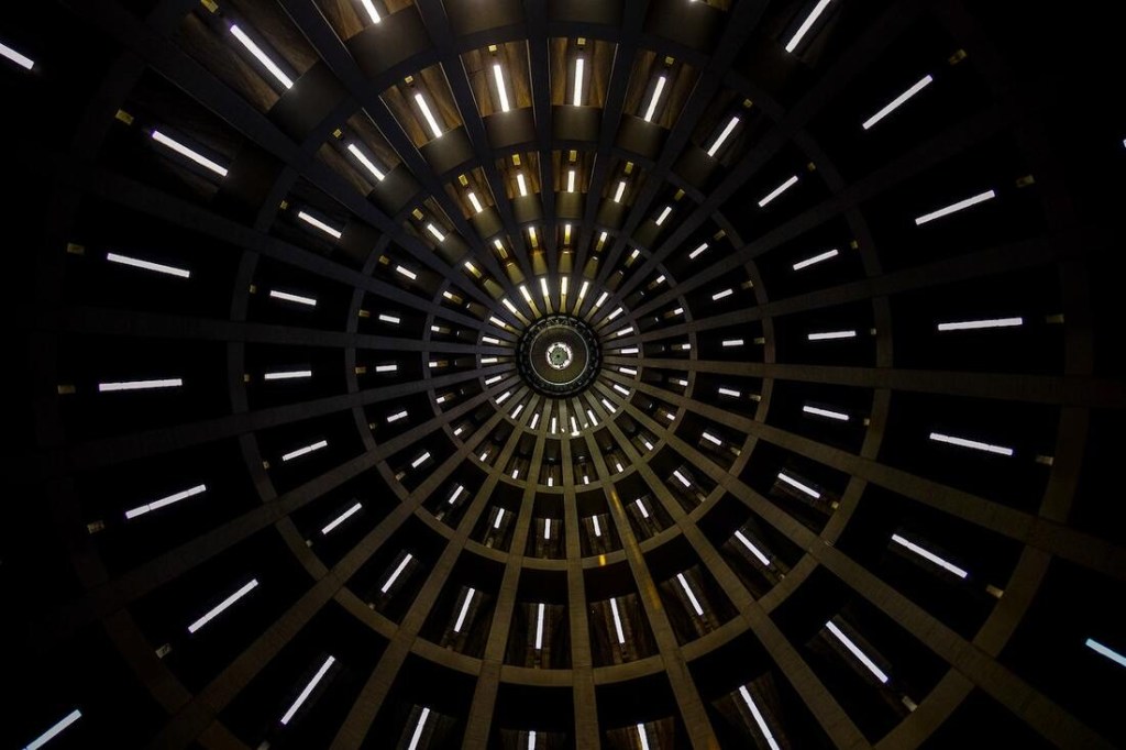 Visual of concentric circles made of neon lights